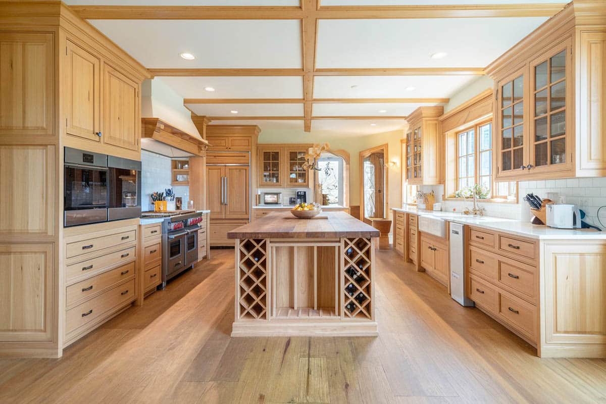 Kitchen with solid pine wood material and center island with wine storage