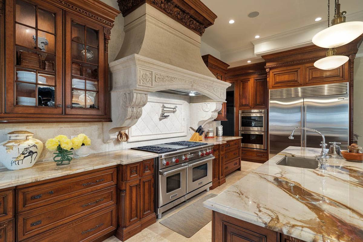 Kitchen with gold granite counters
