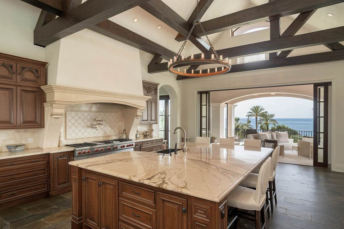 Kitchen with ocean view, raised ceiling and slate floors
