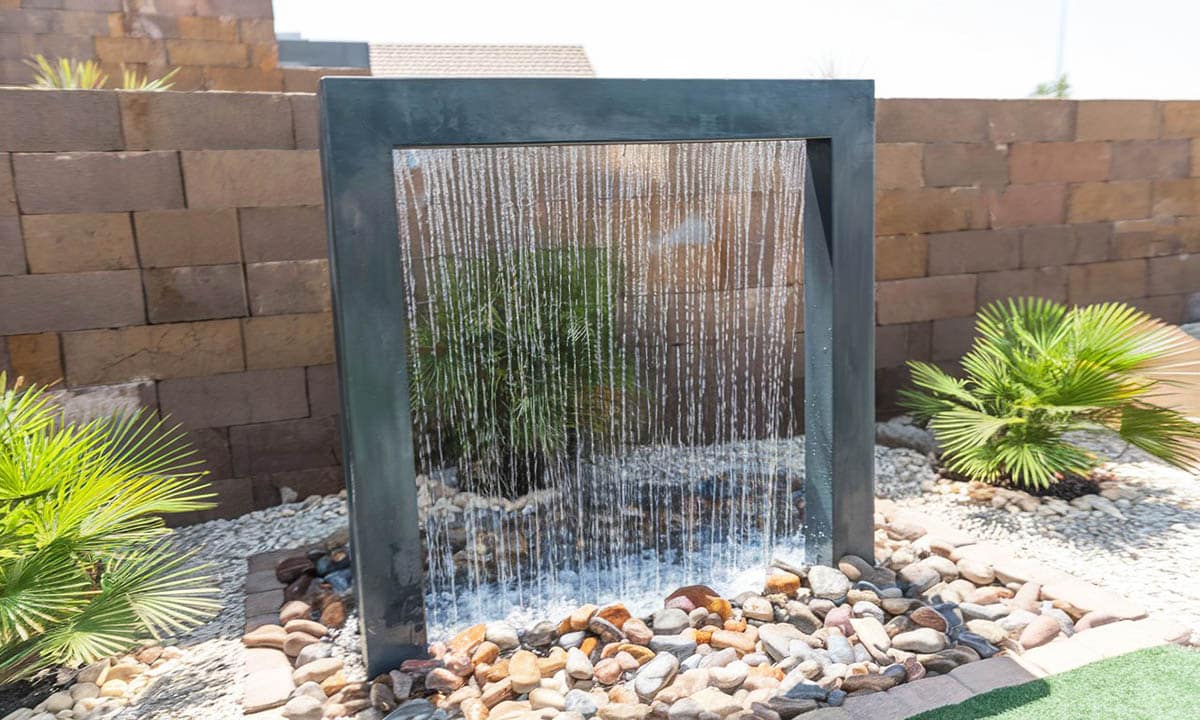 Contemporary waterfall rain shower in backyard