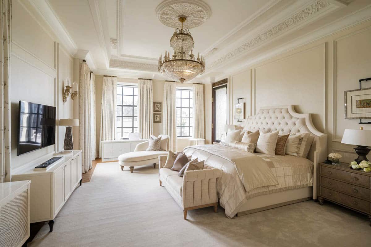 bedroom with elegant decor and tufted chaise lounge