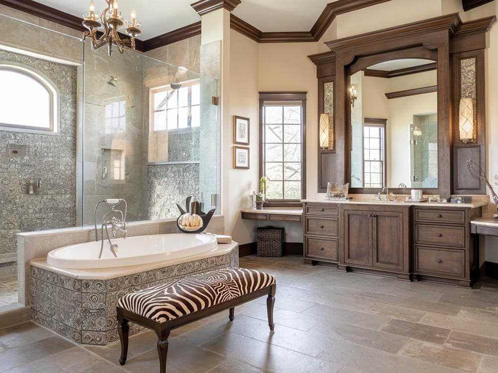 Bathroom with custom wood vanity, large mirror and porcelain tile floors