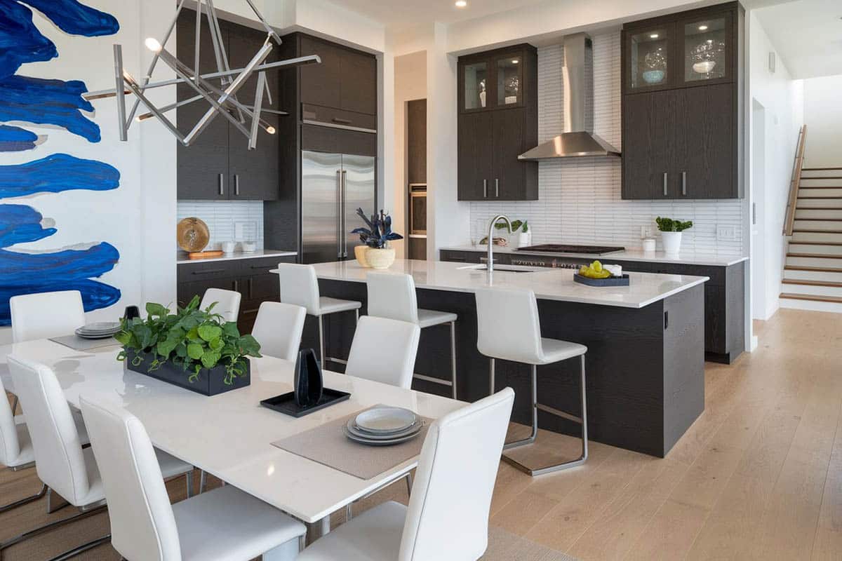 White super thassos glass counters and light wood flooring