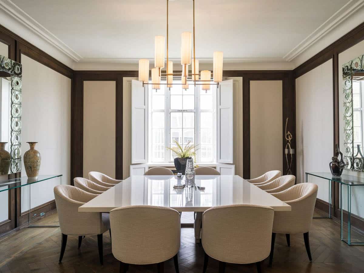 Beige and mahogany color dining room with wood parquet floors