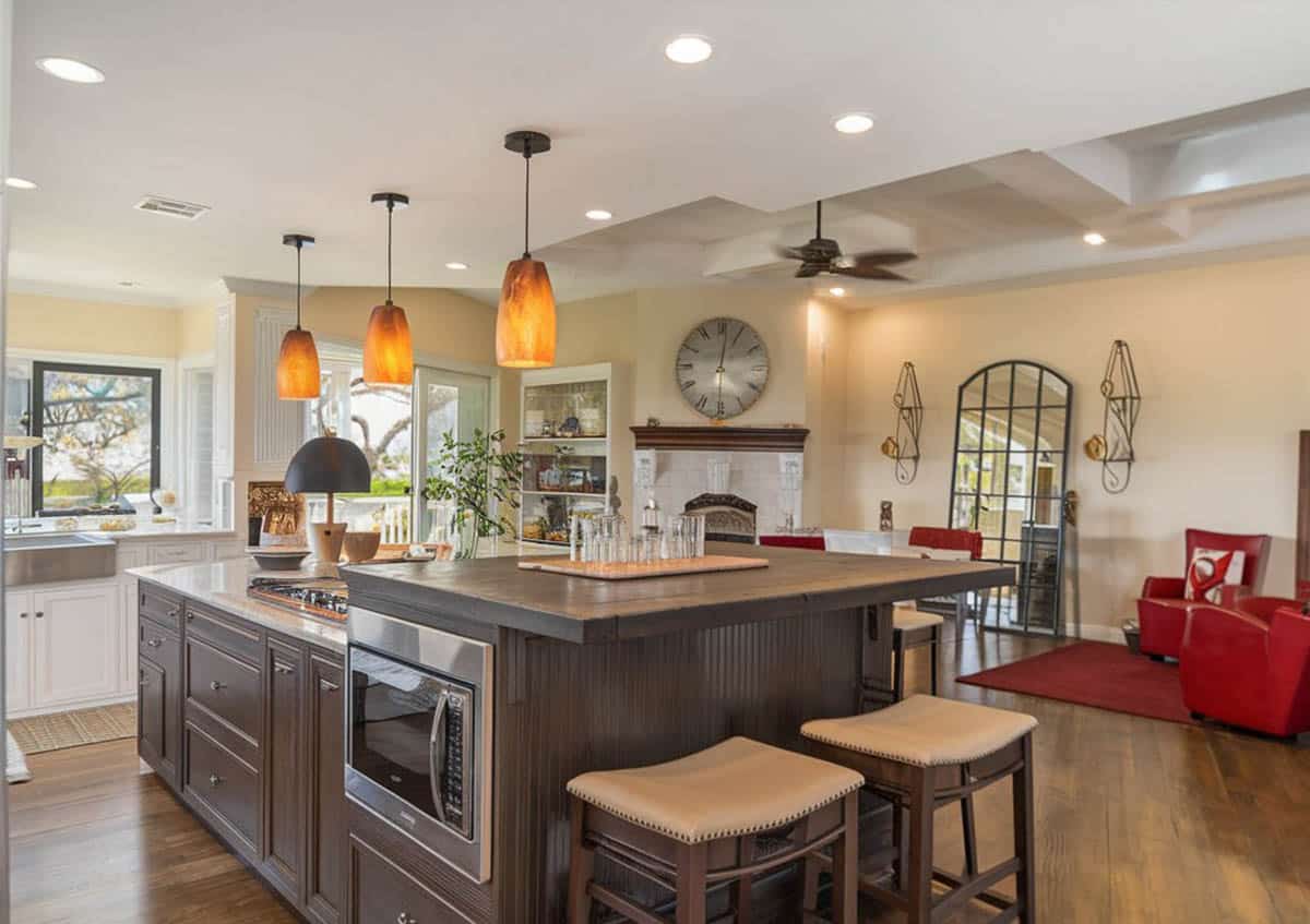 Kitchen with butcher block counter, built-in oven and stovetop