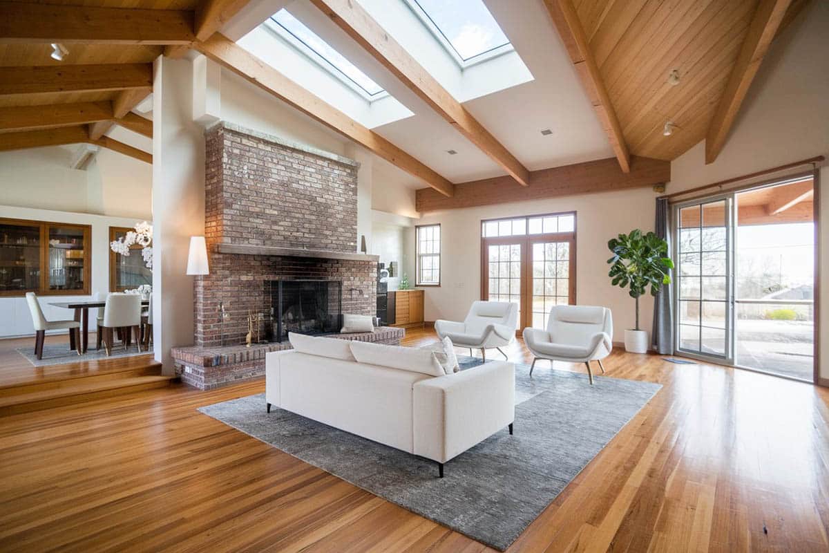 Room with solid teak floors and ceiling with white walls