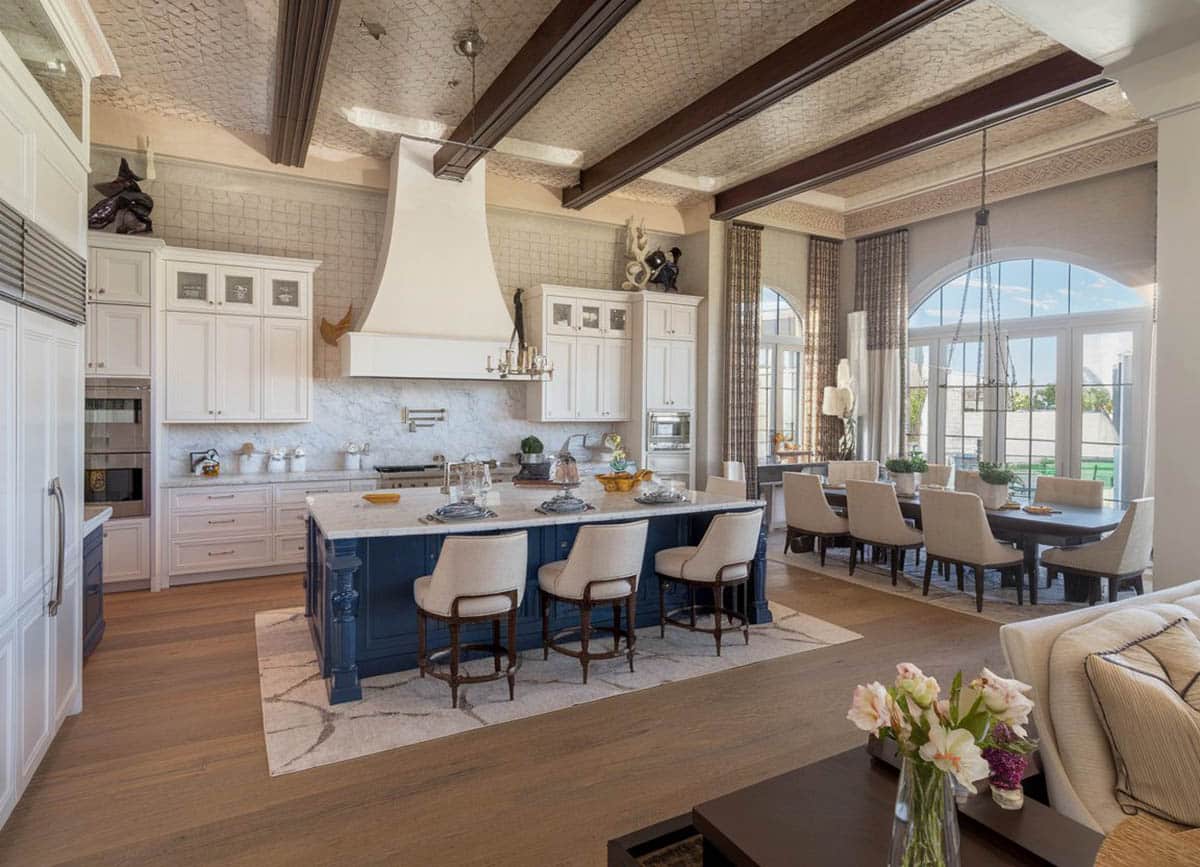 Amazing open concept kitchen with stained ceiling beams