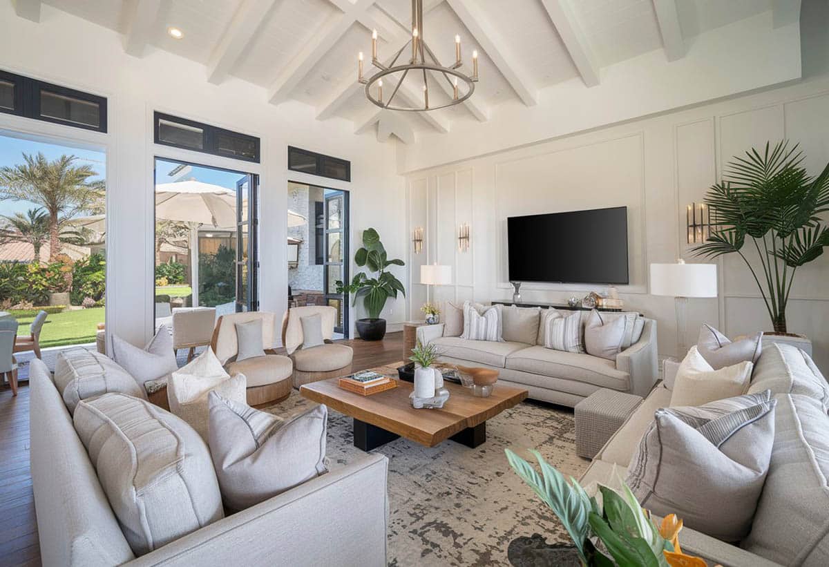 room layout with wall tv and high ceiling