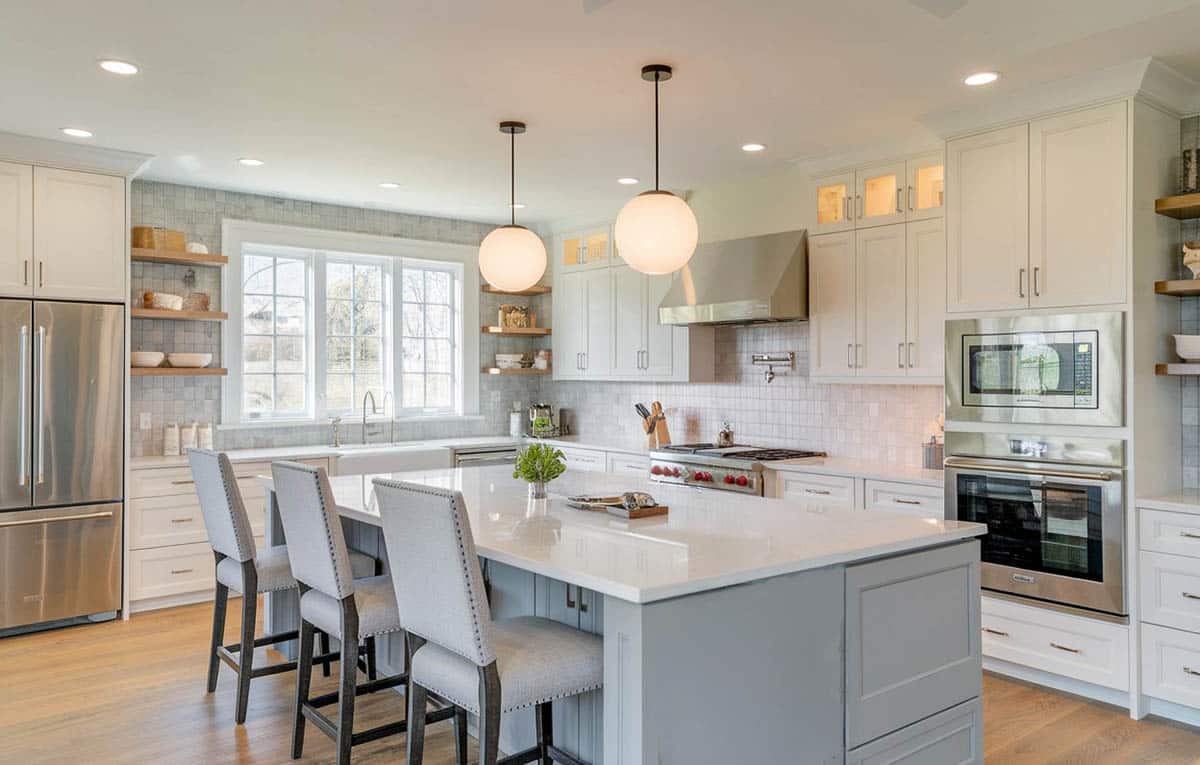 Beautiful kitchen with gray cabinet breakfast bar island and white cabinets