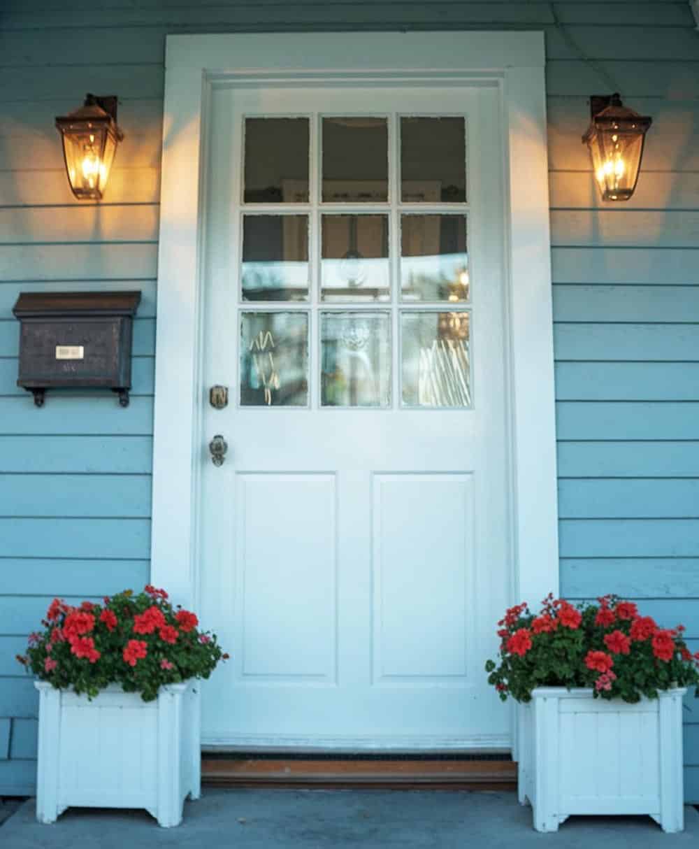 Front entrance to house with white door