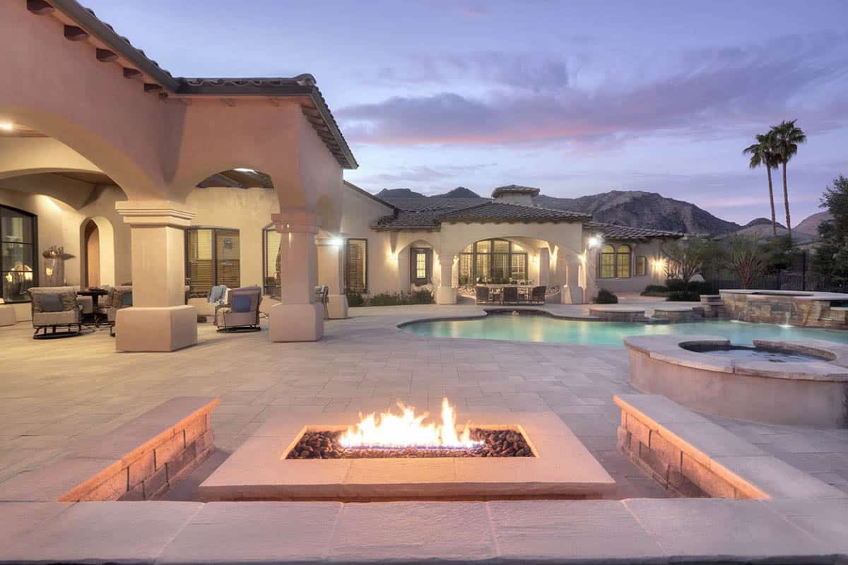 One of the patio ideas that include stone benches