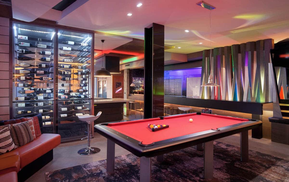 Custom room with neon-style lighting and wine storage