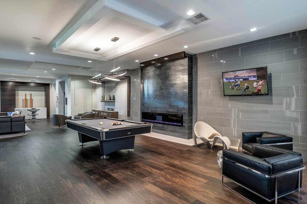 Large modern basement with gray color theme