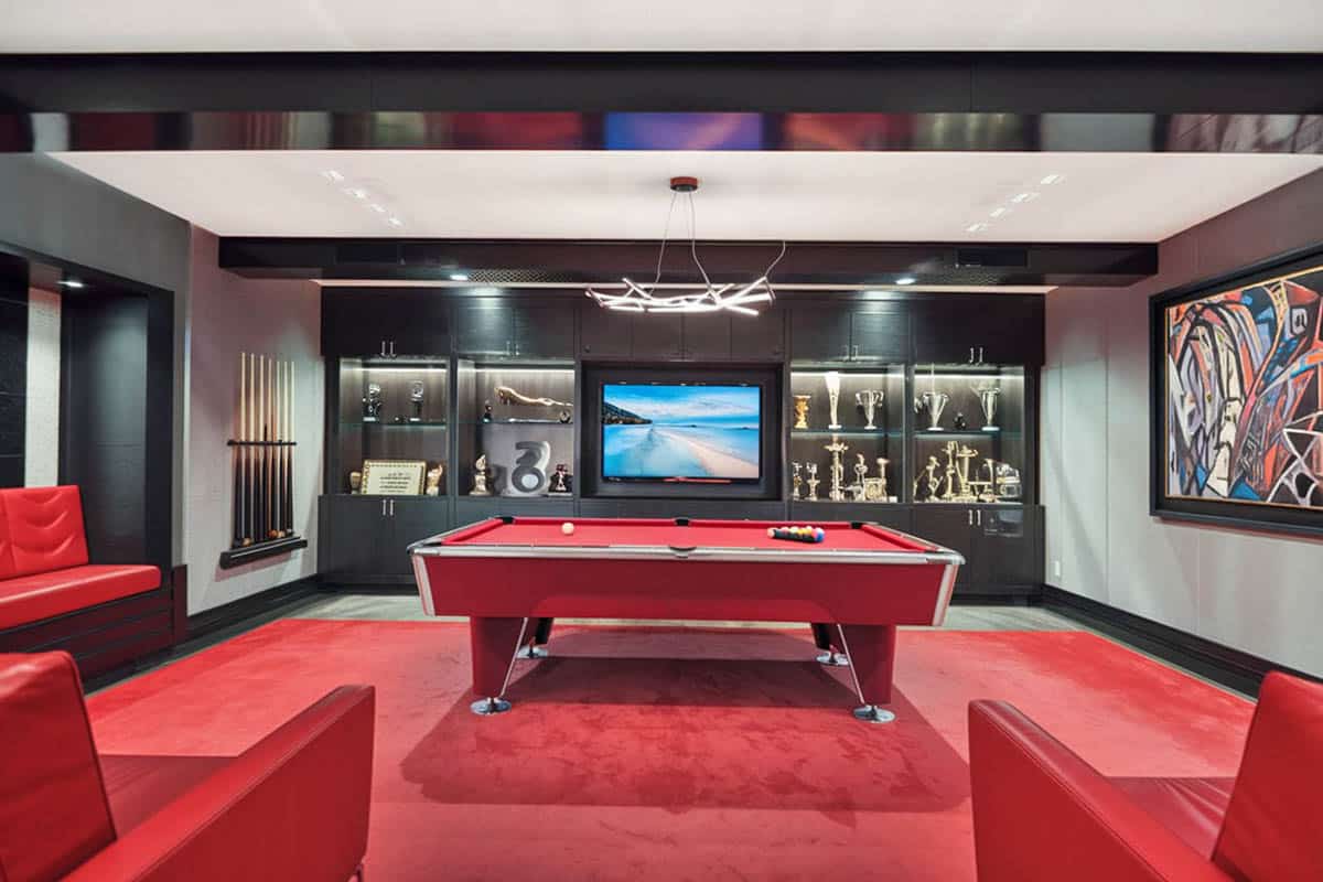 Luxury lounge with red and black decor and alcohol bar