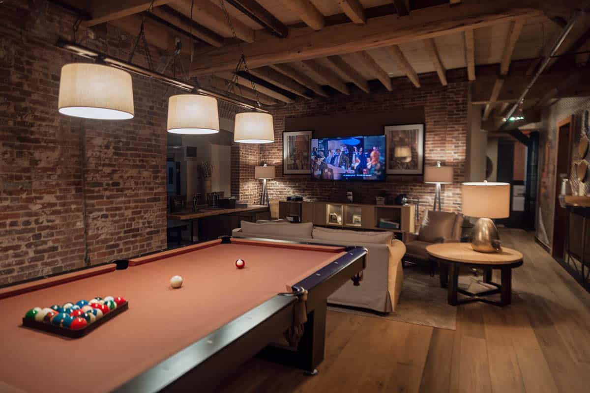 Loft with pool game and brick walls