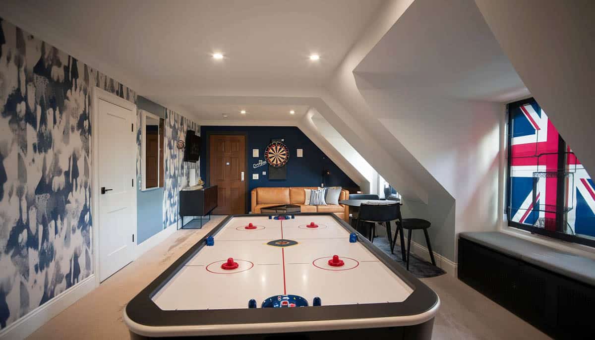 Attic loft with air hockey and furniture