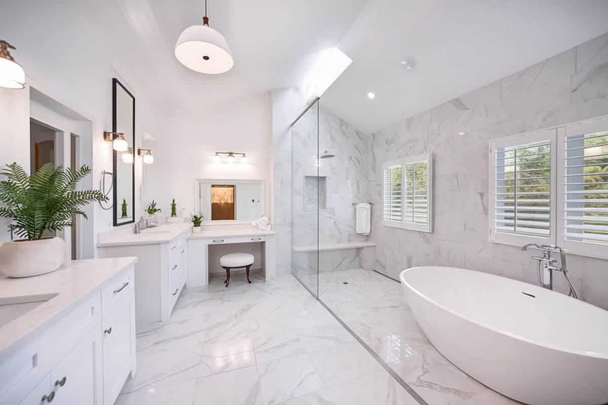 Freestanding tub in long shower area