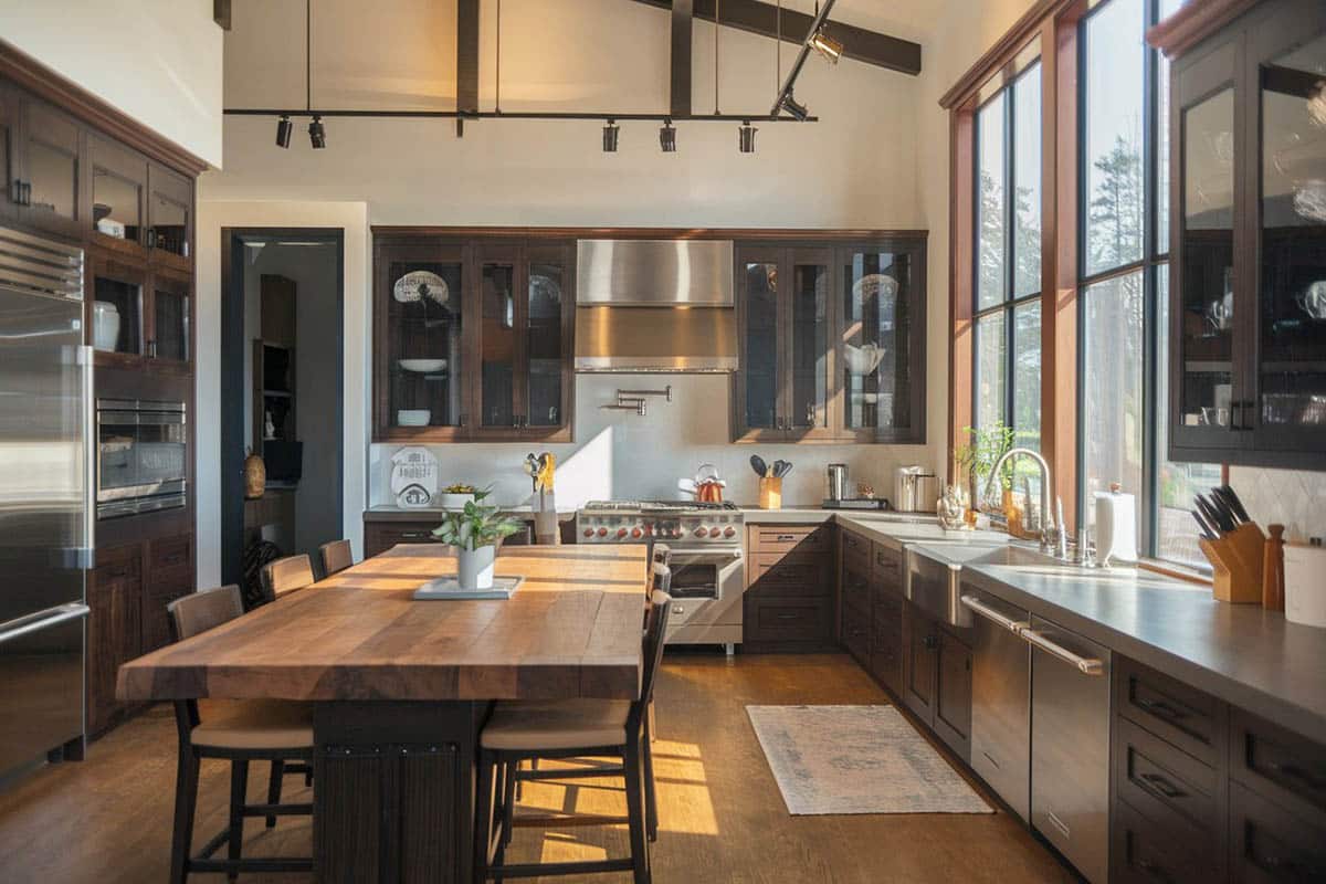 Kitchen with butcher block island and track lighting