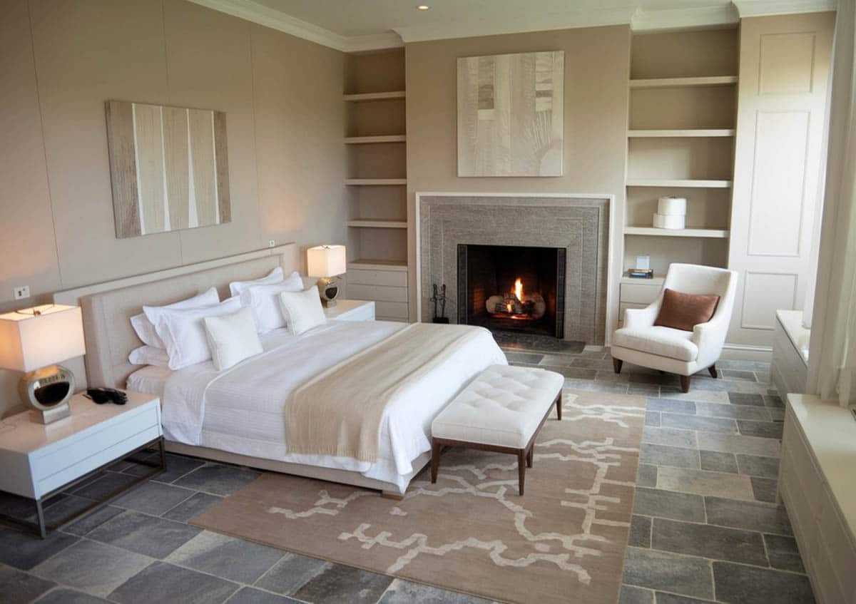 Beige bedroom with warm gray for the floor tile and large area rug