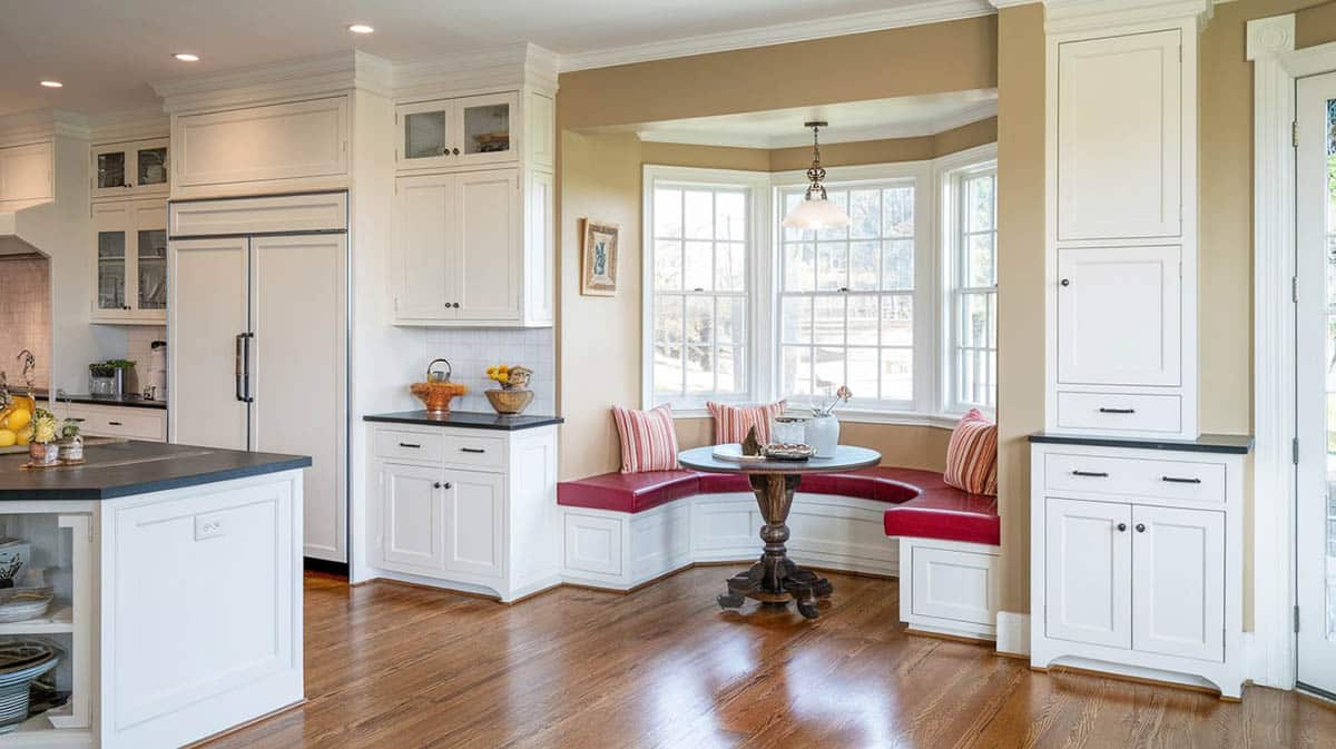 Dining room with built in breakfast nook bench picture windows