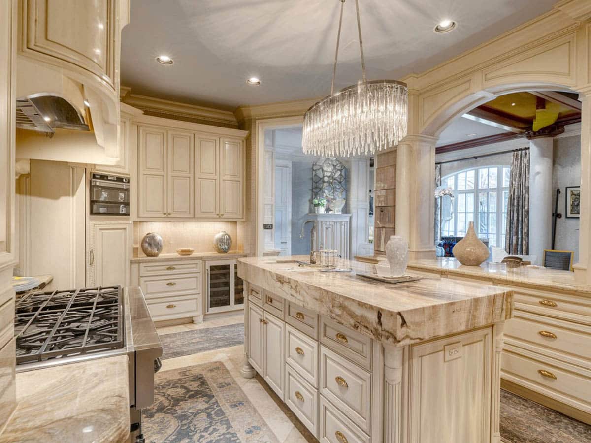Kitchen with Augusta white counter, subway tile backsplash and narrow island