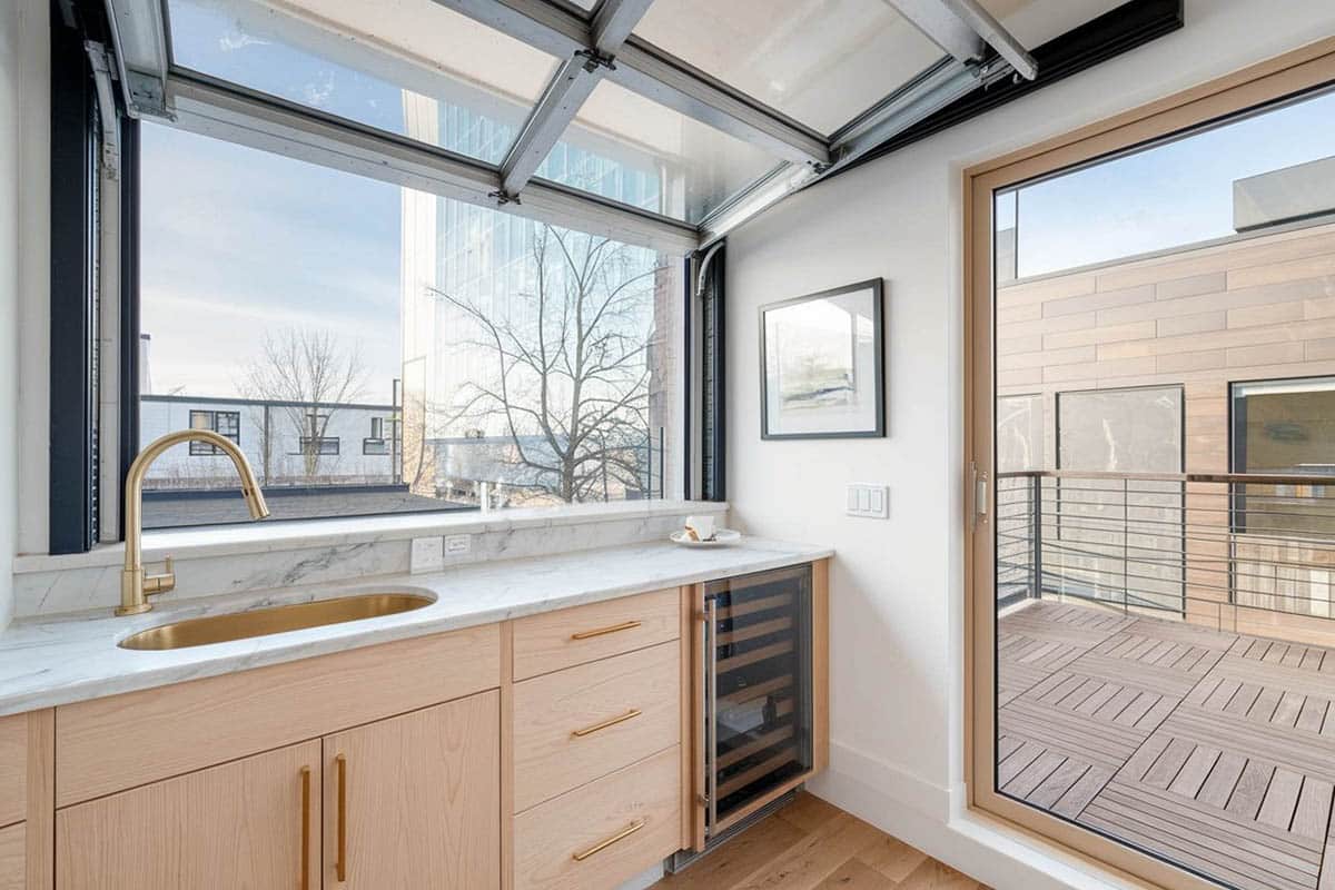 Garage door style kitchen window