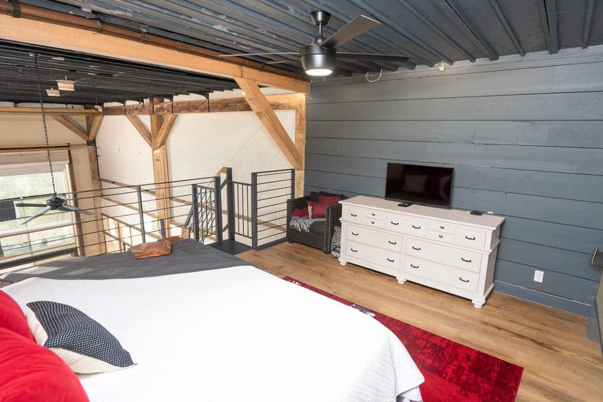 Loft bedroom with corrugated ceiling