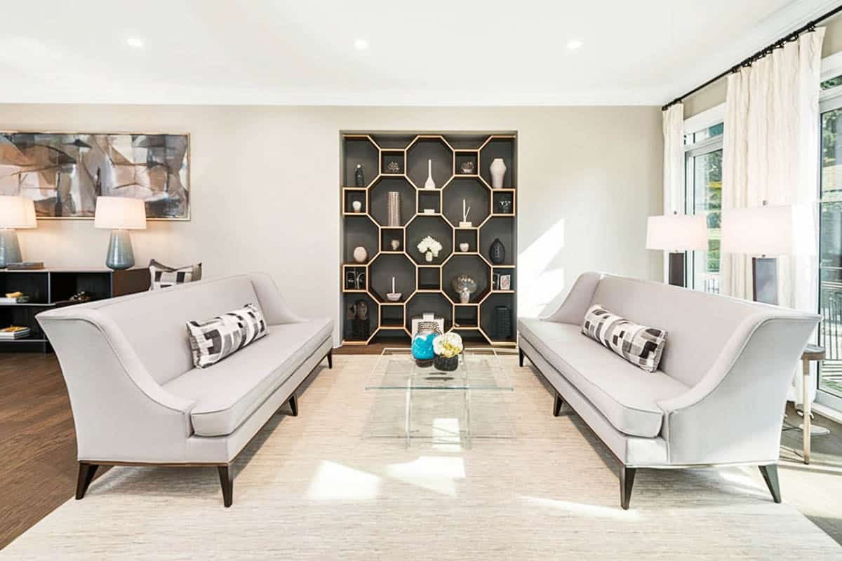 Living room with black gold display niche accent wall