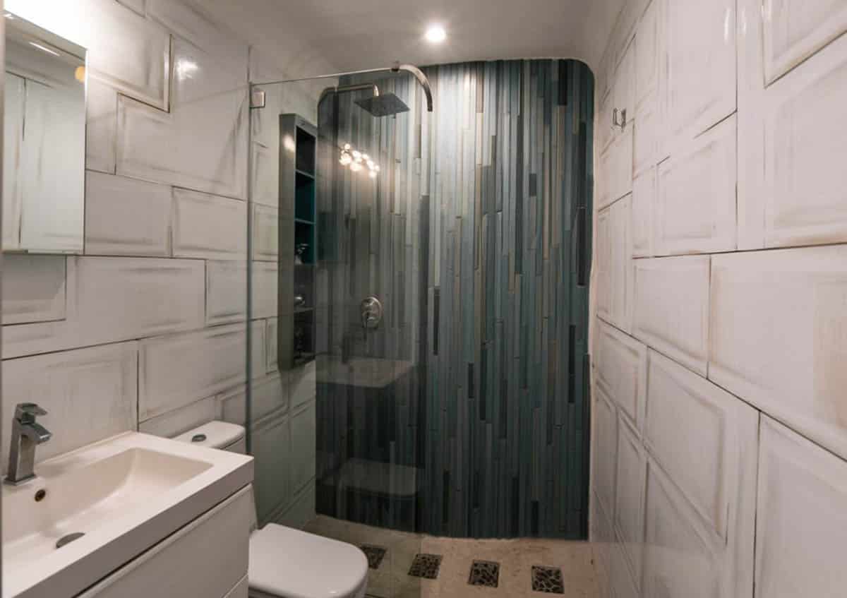 Shower with black linear tile