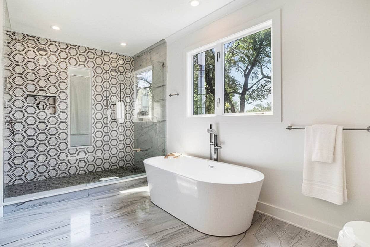 Shower with geometric type tile and picture window