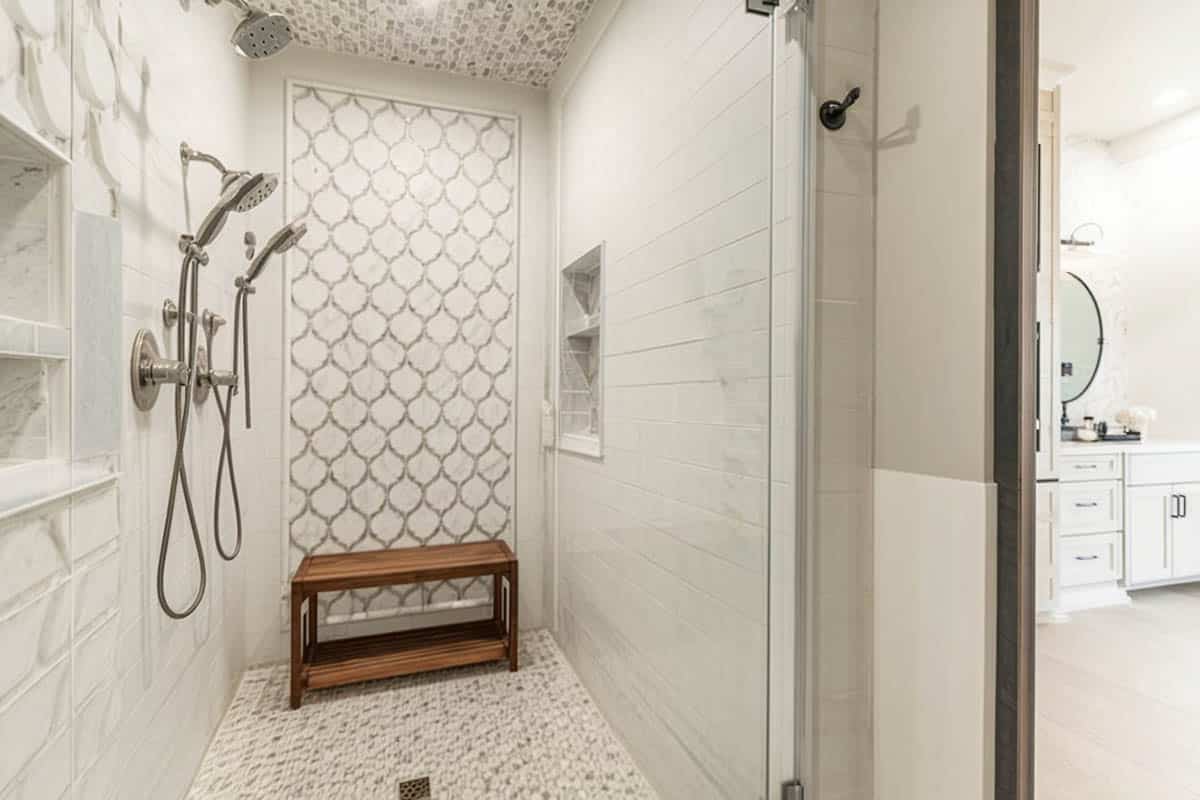 Small shower space with bench with weathered finish
