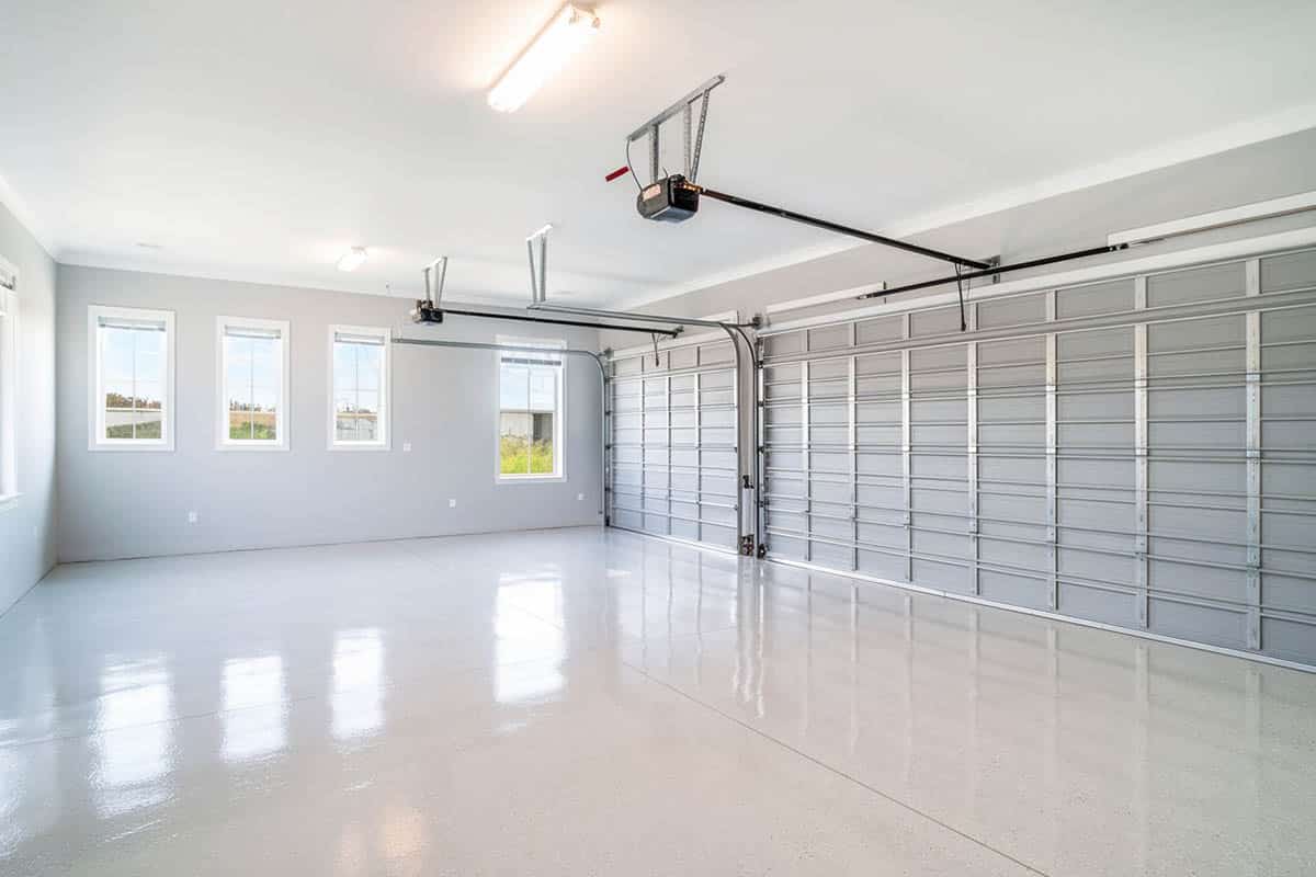Three car garage with white epoxy floors