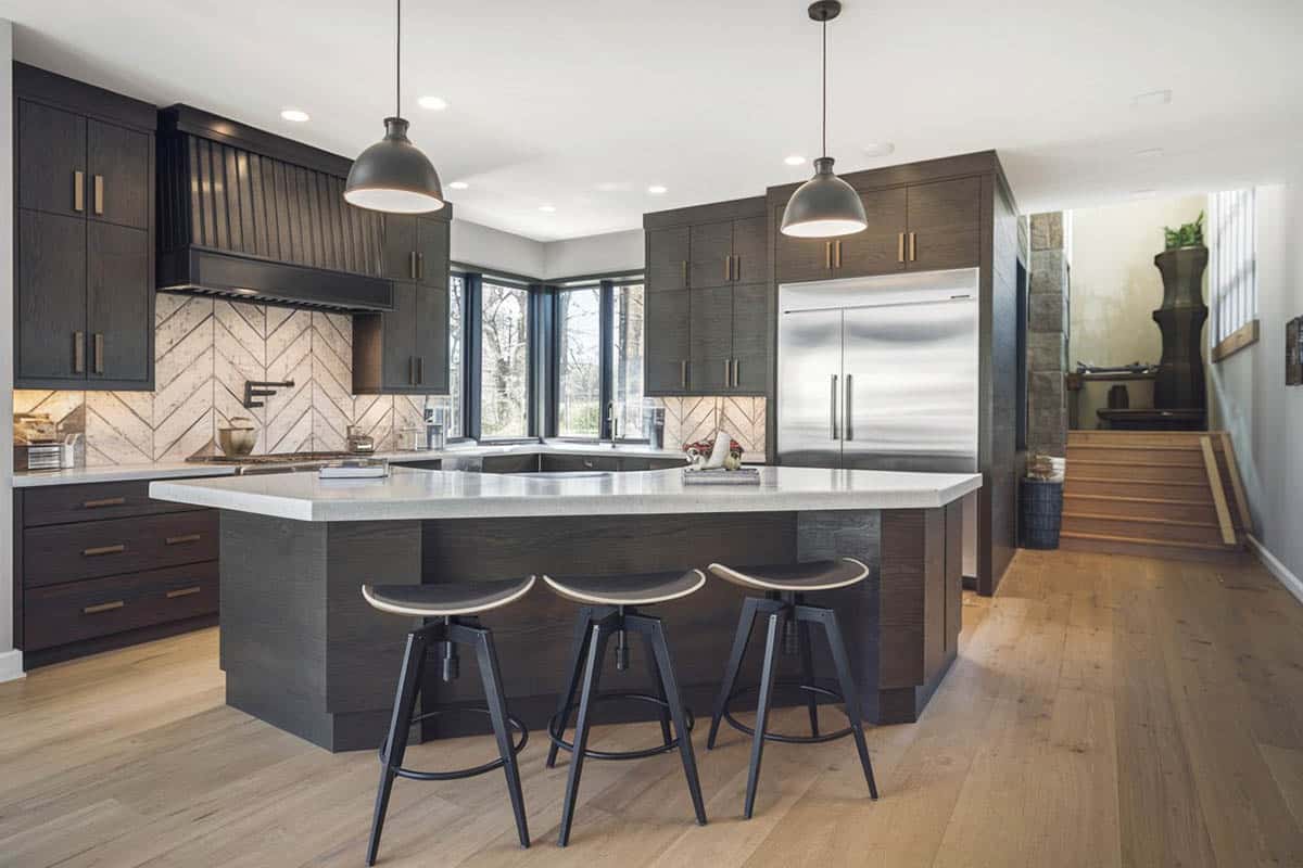 Kitchen with island with geometric pattern backsplash