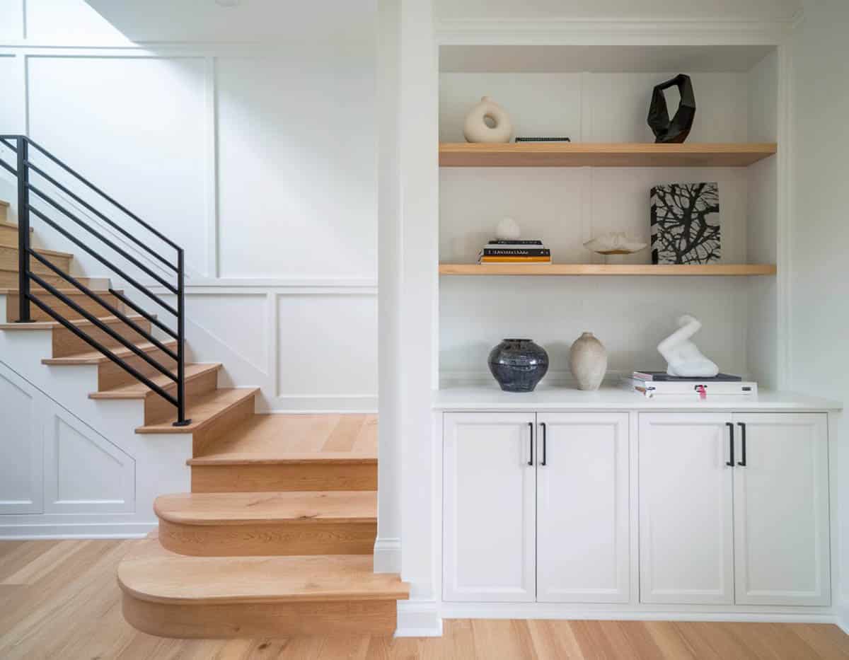 Basement with small hallway and cabinets
