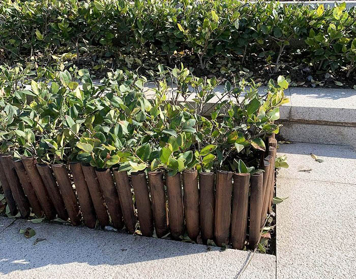 Wooden garden fence edging