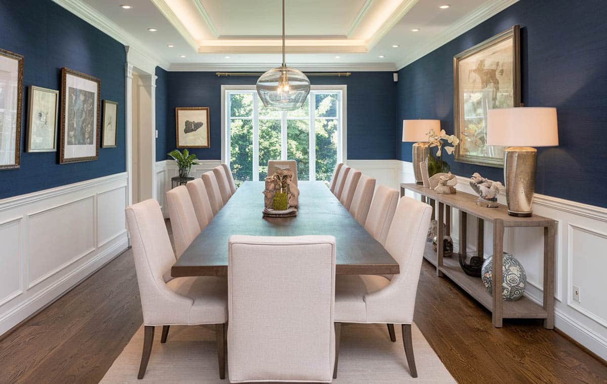 Coastal style dining area with wainscoting