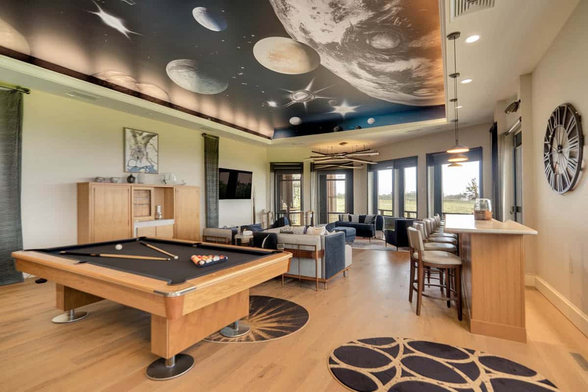 Contemporary room with space wall mural ceiling feature