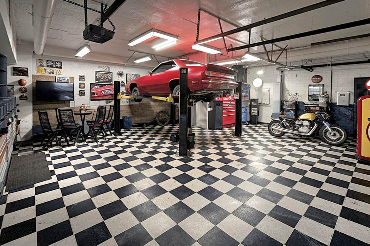 Contemporary garage with black and white checkered floors