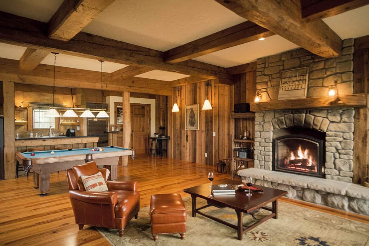 Craftsman style lounge with stone finishes and leather furnishings