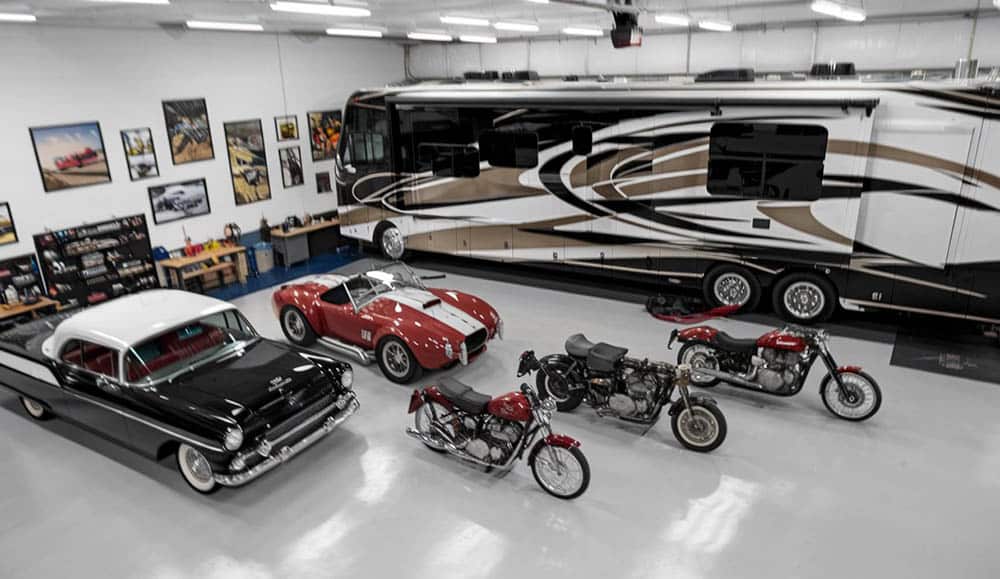 Garage with RV, classic cars and motorcycles