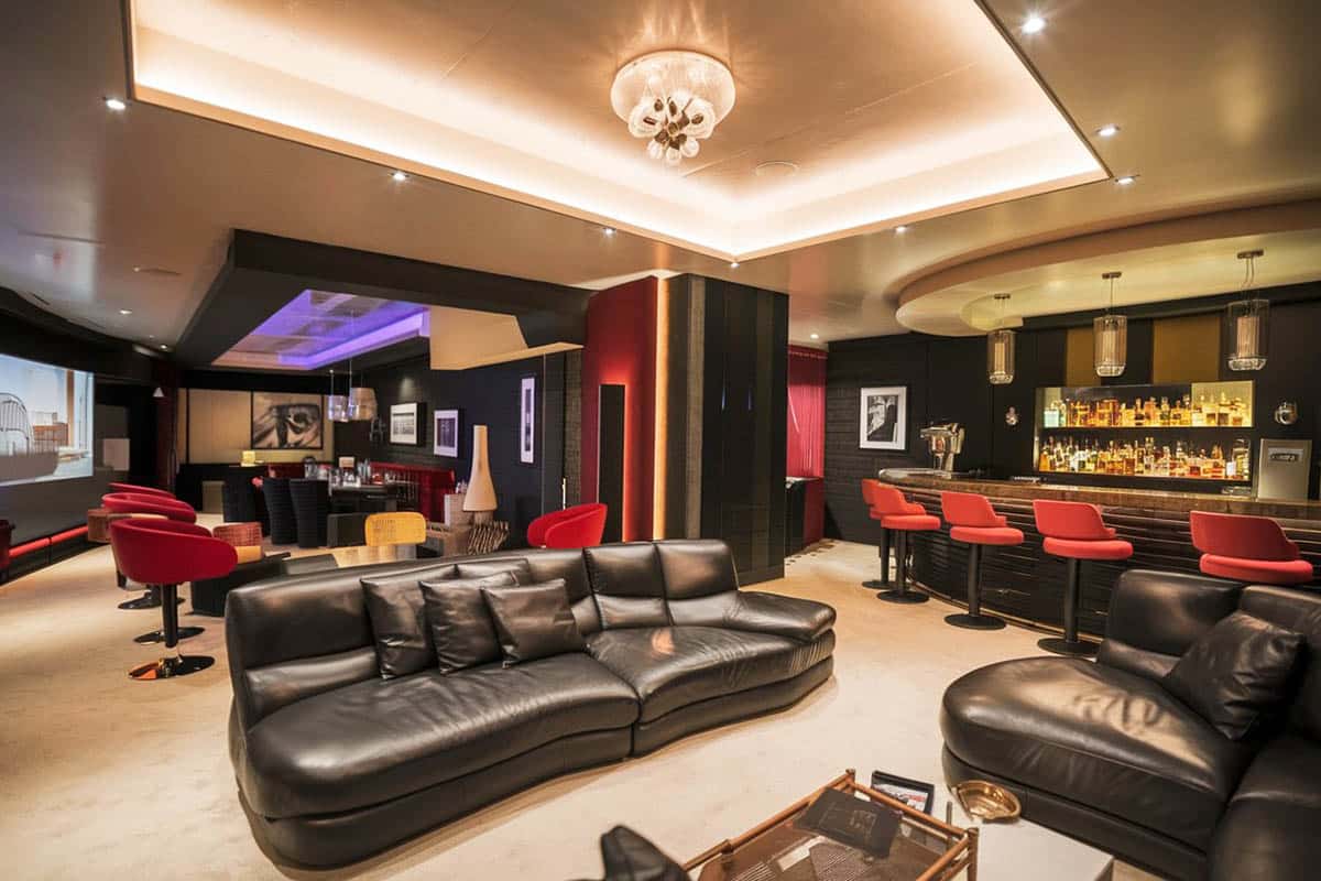 Luxury modern home interior with black leather furniture and stylish bar