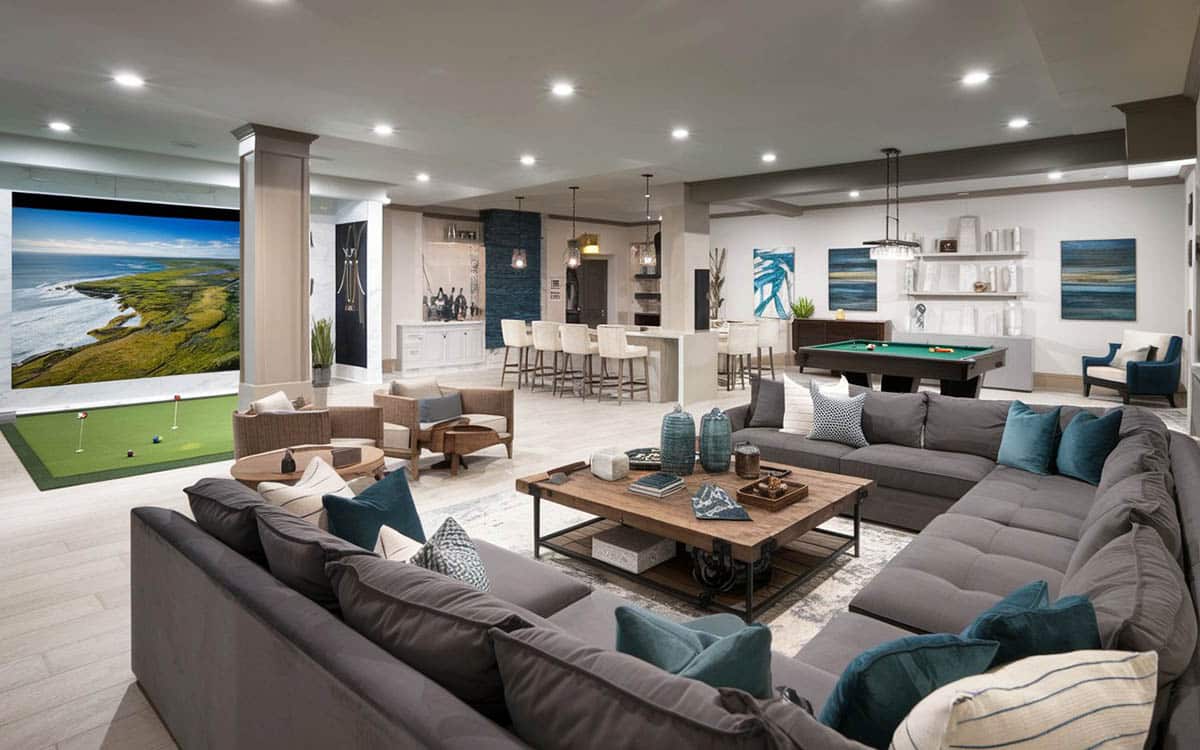 Sectional couch, indoor golf green and bar