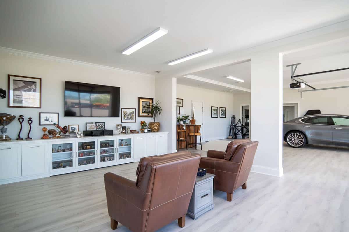 Modern style garage with leather chairs and lounge area