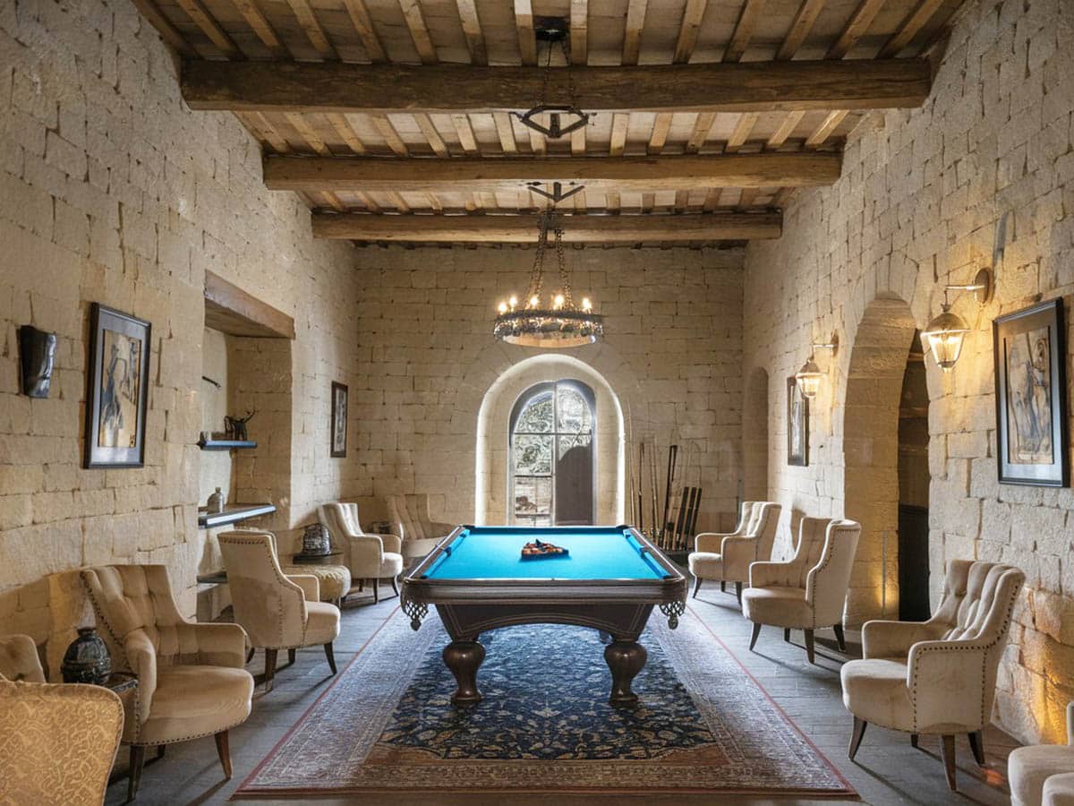 Rustic cave room with intricate ceiling and billiards gaming table