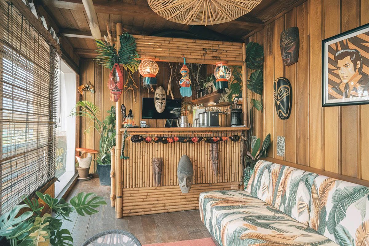 Swanky room with tiki bar and bamboo decor