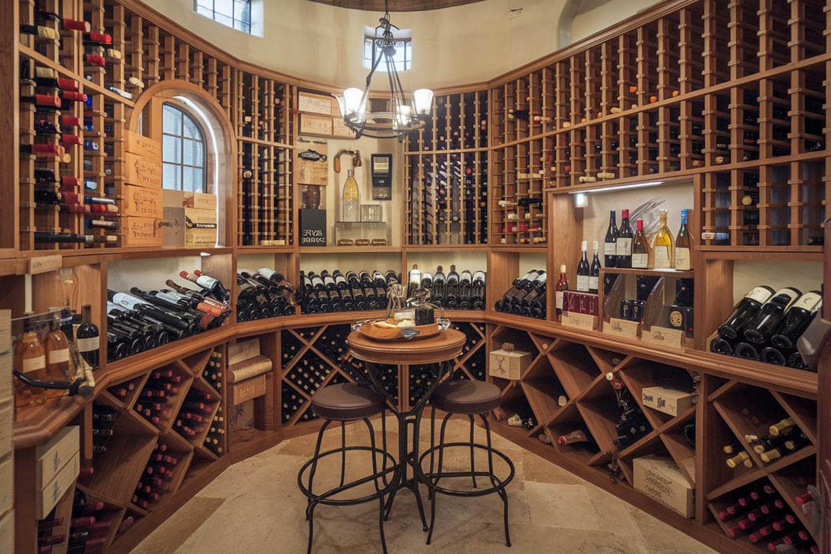 Large custom cellar with floor to ceiling bottle racks